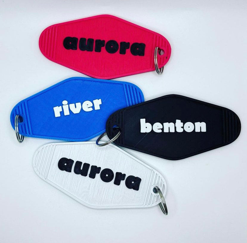 Retro-Style Aurora Downtown Street Key Chain – Collectible Hotel Motif Accessory